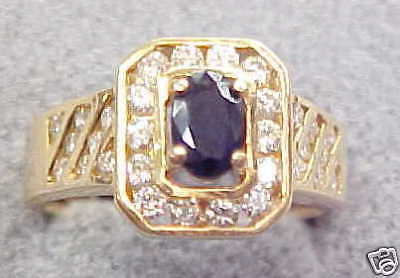 42 Carat Sapphire Ring W/ Diamonds 14k Gold .66 CTW  